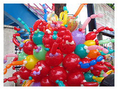 colorful balloons being sold in the Sto. Domingo churchyard